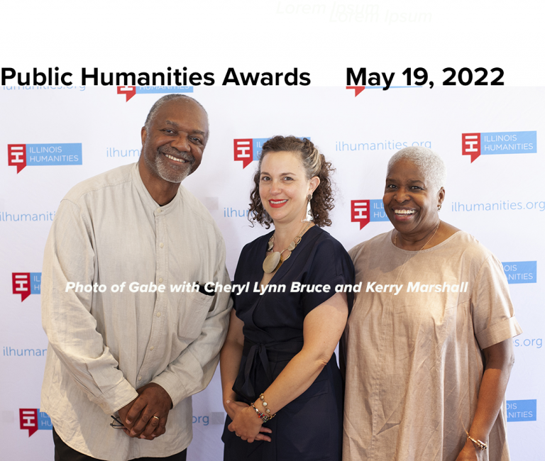 Three people smiling in front of a backdrop that says Illinois Humanities